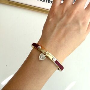 Henri Bendel Gold Bracelet with Red and Heart Charm
